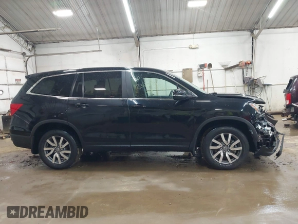 2020 Honda Pilot EX-L z VIN 5FNYF6H58LB061994, wystawiony jako IAAI lot #42358236 z przebiegiem 49 436 mil mil oraz . Historia ofert i sprzedaży dostępna na DreamBid. Obrazek 13.