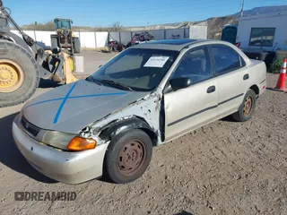1997 Mazda Protege DX with VIN JM1BC1412V0155780, listed as a IAAI auction lot 42134286 with Not Provided miles and . Bid and sale history available at DreamBid. Image 2.