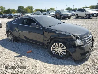 2014 Cadillac CTS Coupe Premium with VIN 1G6DH1E37E0123257, listed as a Copart auction lot 70986454 with 131,978 mi miles and Salvage Title. Bid and sale history available at carsss.com. Image 4.