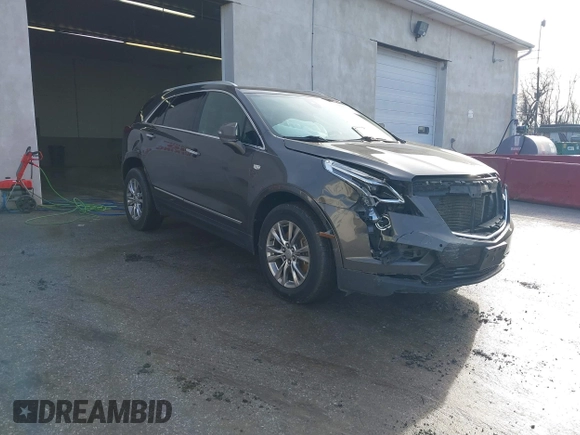 2020 Cadillac XT5 Premium Luxury FWD with VIN 1GYKNCRS0LZ122920, listed as a IAAI auction lot 41021418 with 68,125 mi miles. Bid and sale history available at carsss.com. Image 1.