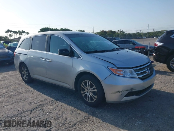 2013 Honda Odyssey EX-L with VIN 5FNRL5H67DB008575, listed as a IAAI auction lot 42008315 with 131,984 mi miles and . Bid and sale history available at carsss.com. Image 1.