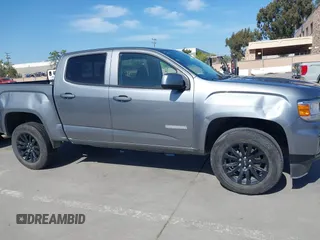 2022 GMC Canyon 4WD Elevation z VIN 1GTG6CENXN1304361, wystawiony jako IAAI lot #41990960 z przebiegiem 23 151 mil mil oraz . Historia ofert i sprzedaży dostępna na DreamBid. Obrazek 13.