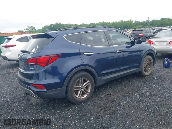 2017 Hyundai Santa Fe 2.4L z VIN 5XYZU3LB7HG418300, wystawiony jako IAAI lot #42369329 z przebiegiem 126 326 mil mil oraz . Historia ofert i sprzedaży dostępna na DreamBid. Obrazek 4.