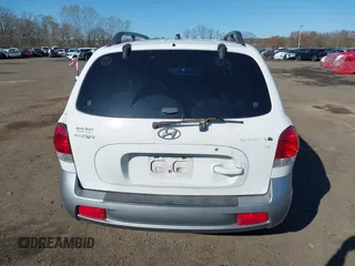 2006 Hyundai Santa Fe GLS z VIN KM8SC13D26U041246, wystawiony jako IAAI lot #42060188 z przebiegiem 150 002 mil mil oraz . Historia ofert i sprzedaży dostępna na DreamBid. Obrazek 16.