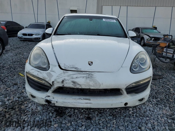 2013 Porsche Cayenne S с VIN WP1AB2A28DLA85229, выставлен на аукционе Copart как лот 50935415 с пробегом 215 629 миль миль и Списание • Salvage title. История ставок и продаж доступна на DreamBid. Изображение 5.