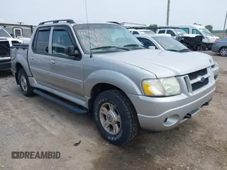 2004 Ford Explorer Sport Trac XLS z VIN 1FMZU77K74UB03292, wystawiony jako IAAI lot #42447875 z przebiegiem 149 691 mil mil oraz . Historia ofert i sprzedaży dostępna na DreamBid. Obrazek 1.