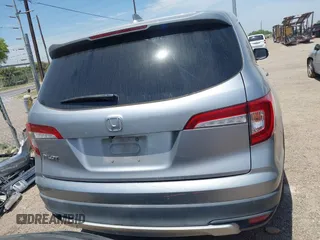 2020 Honda Pilot EX-L z VIN 5FNYF5H52LB007696, wystawiony jako IAAI lot #42065587 z przebiegiem 74 781 mil mil oraz . Historia ofert i sprzedaży dostępna na DreamBid. Obrazek 17.