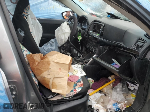 2014 Mazda CX-5 Sport with VIN JM3KE4BE2E0360024, listed as a Copart auction lot 47014035 with Not provided miles and Salvage title. Bid and sale history available at DreamBid. Image 7.