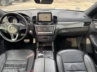 2016 Mercedes-Benz GLE 450 AMG z VIN 4JGED6EB7GA015893, wystawiony jako IAAI lot #41664458 z przebiegiem 75 092 mil mil oraz . Historia ofert i sprzedaży dostępna na DreamBid. Obrazek 6.