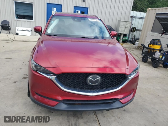 2019 Mazda CX-5 Grand Touring with VIN JM3KFADM2K1657915, listed as a Copart auction lot 56647145 with 85,095 mi miles and Salvage title. Bid and sale history available at DreamBid. Image 5.