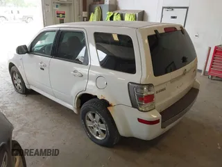 2008 Mercury Mariner with VIN 4M2CU91158KJ33778, listed as a IAAI auction lot 42411724 with 168,359 mi miles and . Bid and sale history available at DreamBid. Image 3.