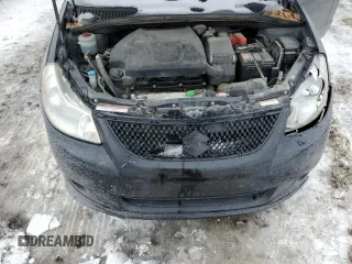 2011 Suzuki SX4 with VIN JS2YC5A44B6300171, listed as a Copart auction lot 87673685 with 116,483 mi miles and Salvage Title. Bid and sale history available at DreamBid. Image 11.