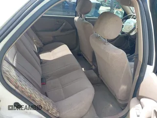 2001 Toyota Camry CE with VIN JT2BG22K210571000, listed as a IAAI auction lot 42061153 with 203,182 mi miles. Bid and sale history available at carsss.com. Image 8.