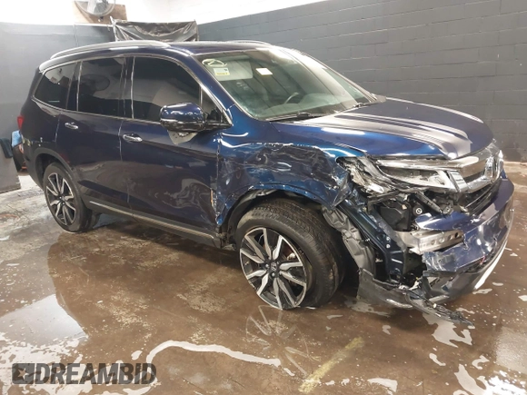 2022 Honda Pilot Touring 7-Passenger with VIN 5FNYF6H65NB052164, listed as a IAAI auction lot 41641601 with 51,700 mi miles. Bid and sale history available at carsss.com. Image 1.