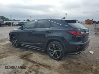 2017 Lexus RX 350 with VIN 2T2BZMCA9HC129460, listed as a Copart auction lot 57301995 with 163,128 mi miles and Salvage title. Bid and sale history available at DreamBid. Image 2.
