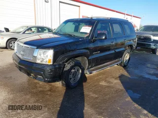 2003 Cadillac Escalade z VIN 1GYEK63N63R196238, wystawiony jako IAAI lot #41426210 z przebiegiem 296 853 mil mil oraz . Historia ofert i sprzedaży dostępna na DreamBid. Obrazek 2.