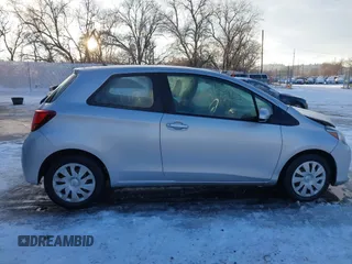 2015 Toyota Yaris L with VIN VNKJTUD36FA036518, listed as a IAAI auction lot 41233406 with 138,481 mi miles. Bid and sale history available at carsss.com. Image 13.