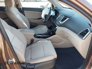 2017 Hyundai Tucson SE with VIN KM8J23A40HU525982, listed as a IAAI auction lot 41790898 with 107,715 mi miles. Bid and sale history available at carsss.com. Image 5.