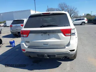 2012 Jeep Grand Cherokee Laredo with VIN 1C4RJFAT4CC229204, listed as a IAAI auction lot 41659491 with 141,143 mi miles. Bid and sale history available at carsss.com. Image 16.