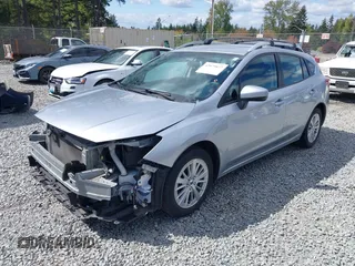 2017 Subaru Impreza Premium with VIN 4S3GTAB67H3753287, listed as a IAAI auction lot 42075877 with 55,247 mi miles. Bid and sale history available at carsss.com. Image 2.
