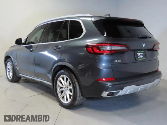 2022 BMW X5 sDrive40i with VIN 5UXCR4C00N9L79444, listed as a Copart auction lot 43563295 with 66,896 mi miles and Clean Title. Bid and sale history available at carsss.com. Image 4.