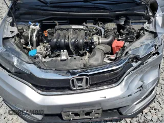 2018 Honda Fit Sport z VIN 3HGGK5H68JM736263, wystawiony jako Copart lot #57206675 z przebiegiem 25 494 mil mil oraz Szkoda całkowita • Salvage title. Historia ofert i sprzedaży dostępna na DreamBid. Obrazek 11.