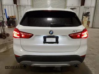 2018 BMW X1 xDrive28i with VIN WBXHT3C30J5K29917, listed as a Copart auction lot 56165845 with 131,876 mi miles and Salvage title. Bid and sale history available at DreamBid. Image 6.