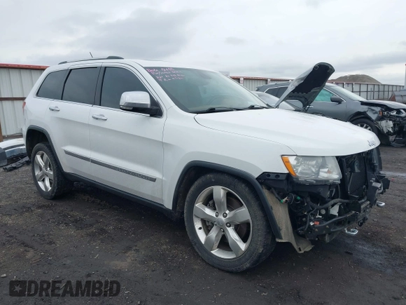 2013 Jeep Grand Cherokee Overland with VIN 1C4RJFCT4DC640553, listed as a IAAI auction lot 41311413 with 146,212 mi miles. Bid and sale history available at carsss.com. Image 1.