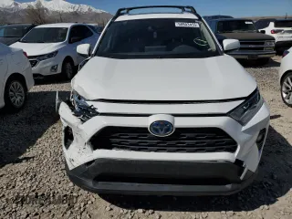 2021 Toyota RAV4 Hybrid XLE with VIN JTMRWRFV6MD559354, listed as a Copart auction lot 50803455 with 56,604 mi miles and Salvage Title. Bid and sale history available at carsss.com. Image 5.