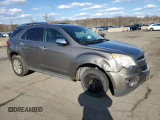 2010 Chevrolet Equinox LTZ z VIN 2CNALFEW9A6239966, wystawiony jako Copart lot #50201295 z przebiegiem 195 470 mil mil oraz Czysty tytuł • Clean title. Historia ofert i sprzedaży dostępna na DreamBid. Obrazek 4.