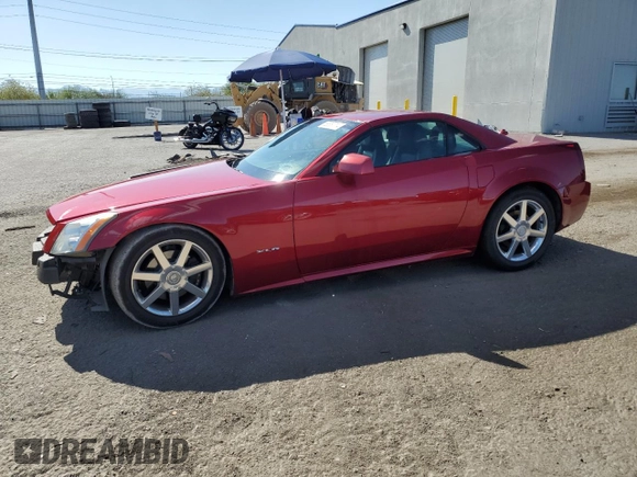 2004 Cadillac XLR z VIN 1G6YV34A345600127, wystawiony jako Copart lot #68859774 z przebiegiem 40 727 mil mil oraz Szkody całkowita. Historia ofert i sprzedaży dostępna na DreamBid. Obrazek 1.