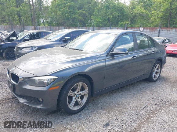 2014 BMW 3 Series 320i xDrive with VIN WBA3C3C57EP662795, listed as a IAAI auction lot 42267683 with 153,451 mi miles and . Bid and sale history available at DreamBid. Image 2.