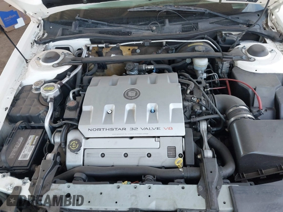 2002 Cadillac Eldorado z VIN 1G6EC12922B106670, wystawiony jako IAAI lot #41648782 z przebiegiem 174 320 mil mil oraz . Historia ofert i sprzedaży dostępna na DreamBid. Obrazek 10.