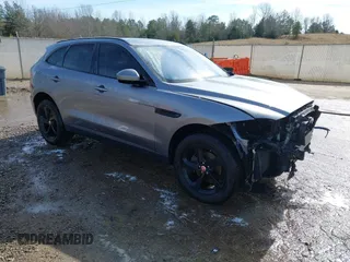 2020 Jaguar F-Pace 25t Premium with VIN SADCJ2FX7LA630157, listed as a IAAI auction lot 41410660 with 58,972 mi miles and . Bid and sale history available at DreamBid. Image 1.