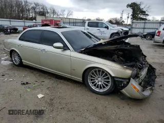 2006 Jaguar XJ with VIN SAJWA79B76SH08803, listed as a Copart auction lot 40268774 with 0 mi miles and Salvage Title. Bid and sale history available at carsss.com. Image 4.