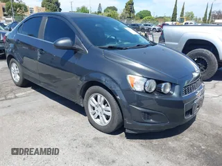 2014 Chevrolet Sonic LT with VIN 1G1JC5SB7E4146444, listed as a IAAI auction lot 42014386 with 85,122 mi miles and . Bid and sale history available at DreamBid. Image 1.