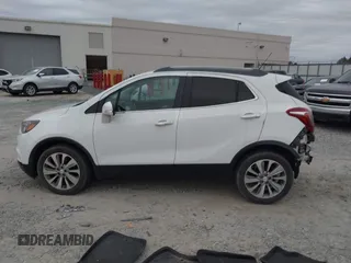 2017 Buick Encore Essence with VIN KL4CJCSB7HB011839, listed as a IAAI auction lot 41303660 with 80,789 mi miles and . Bid and sale history available at carsss.com. Image 15.