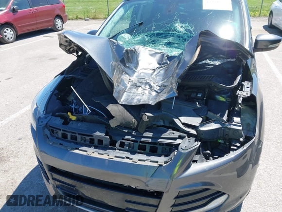 2015 Ford Escape Titanium z VIN 1FMCU9J92FUB01007, wystawiony jako IAAI lot #42319246 z przebiegiem 90 782 mil mil oraz . Historia ofert i sprzedaży dostępna na DreamBid. Obrazek 6.