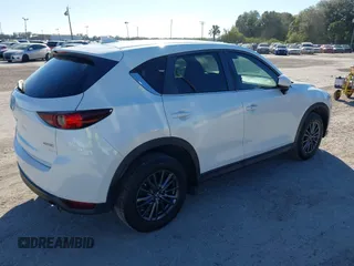 2020 Mazda CX-5 Touring with VIN JM3KFACM6L0737727, listed as a IAAI auction lot 41283200 with 85,949 mi miles and . Bid and sale history available at carsss.com. Image 4.