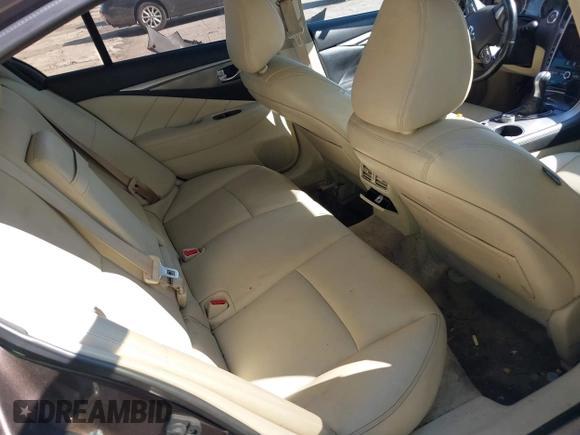 2015 Infiniti Q50 Premium z VIN JN1BV7AR3FM396882, wystawiony jako IAAI lot #37523335 z przebiegiem 89 761 mil mil oraz . Historia ofert i sprzedaży dostępna na DreamBid. Obrazek 8.