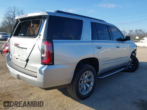 2020 GMC Yukon SLT Standard Edition with VIN 1GKS2DKCXLR294027, listed as a IAAI auction lot 41004965 with 69,161 mi miles. Bid and sale history available at carsss.com. Image 4.