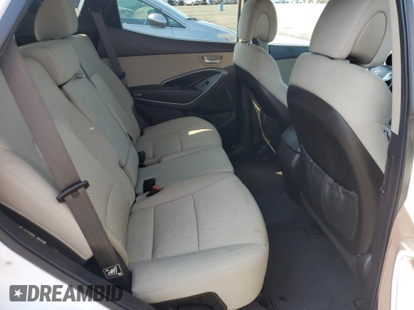 2014 Hyundai Santa Fe z VIN 5XYZTDLB9EG195651, wystawiony jako Copart lot #61422625 z przebiegiem 61 128 mil mil oraz Szkoda całkowita • Salvage title. Historia ofert i sprzedaży dostępna na DreamBid. Obrazek 11.