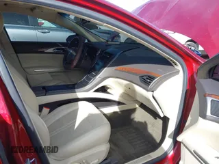 2015 Lincoln MKZ z VIN 3LN6L2G94FR619447, wystawiony jako IAAI lot #41831679 z przebiegiem 97 906 mil mil oraz . Historia ofert i sprzedaży dostępna na DreamBid. Obrazek 5.