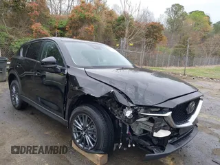 2020 Mazda CX-5 Touring with VIN JM3KFACM9L0770933, listed as a IAAI auction lot 41921464 with 75,997 mi miles. Bid and sale history available at carsss.com. Image 1.