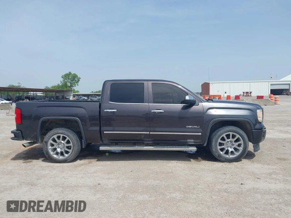 2014 GMC Sierra 1500 Denali with VIN 3GTU2WEC3EG390936, listed as a IAAI auction lot 42253577 with 196,852 mi miles and . Bid and sale history available at DreamBid. Image 13.