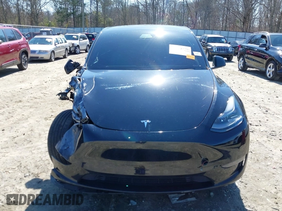 2021 Tesla Model Y Performance with VIN 5YJYGDEF6MF252877, listed as a IAAI auction lot 41770770 with 58,550 mi miles and . Bid and sale history available at DreamBid. Image 12.
