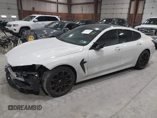 2020 BMW M8 with VIN WBSGV0C06LCE47698, listed as a IAAI auction lot 41457199 with 50,772 mi miles. Bid and sale history available at carsss.com. Image 2.