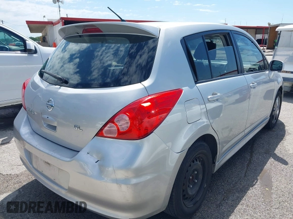 2012 Nissan Versa S with VIN 3N1BC1CP3CK253098, listed as a IAAI auction lot 42111977 with 180,210 mi miles. Bid and sale history available at carsss.com. Image 4.
