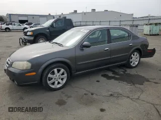 2002 Nissan Maxima GLE z VIN JN1DA31A12T323002, wystawiony jako Copart lot #49682205 z przebiegiem 99 681 mil mil oraz Szkoda całkowita • Salvage title. Historia ofert i sprzedaży dostępna na DreamBid. Obrazek 1.