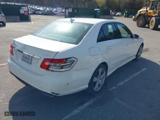 2012 Mercedes-Benz E-Class E 350 Luxury with VIN WDDHF8JB2CA619686, listed as a IAAI auction lot 42079521 with 129,025 mi miles. Bid and sale history available at carsss.com. Image 4.
